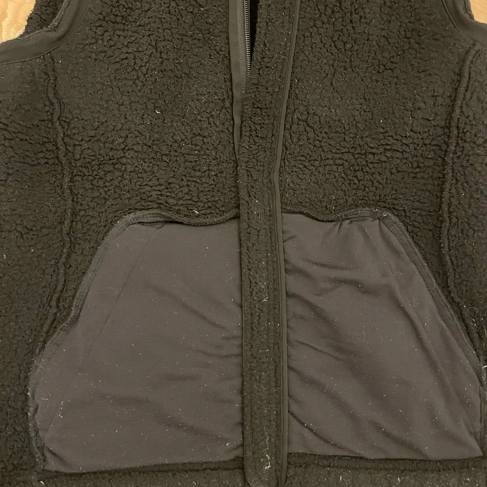 The North Face Black Sherpa Vest, size medium